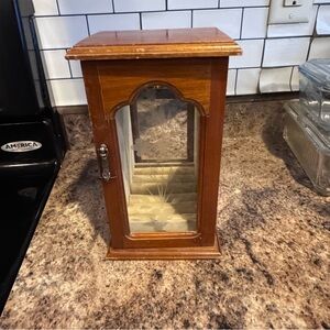 vintage wooden jewelry armoire box glass front necklaces, rings, and earrings